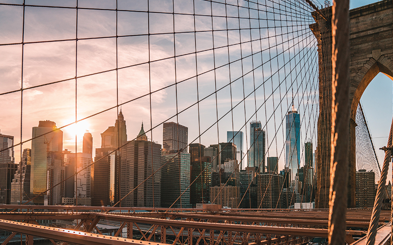 New York behind a bridge sunset