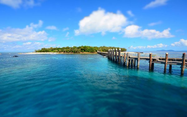 Crystal blue water with a bridge