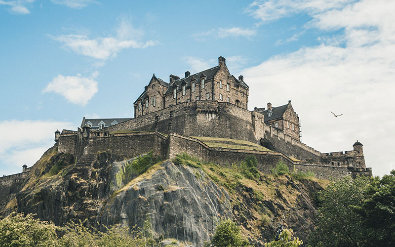 Edinburgh Castle with bird flying