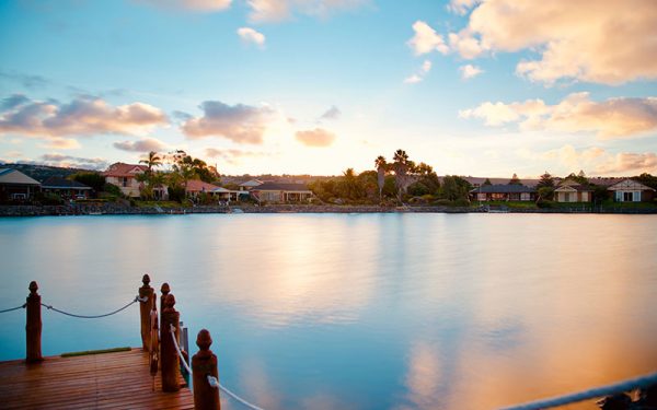 Calm waters with houses around