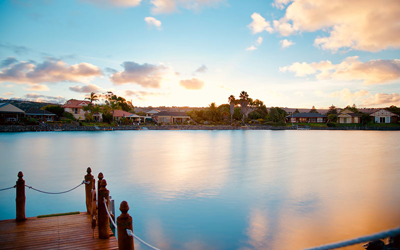 Calm waters with houses around