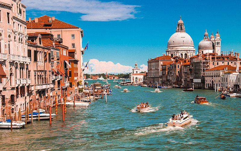 People sailing in boats in Venice