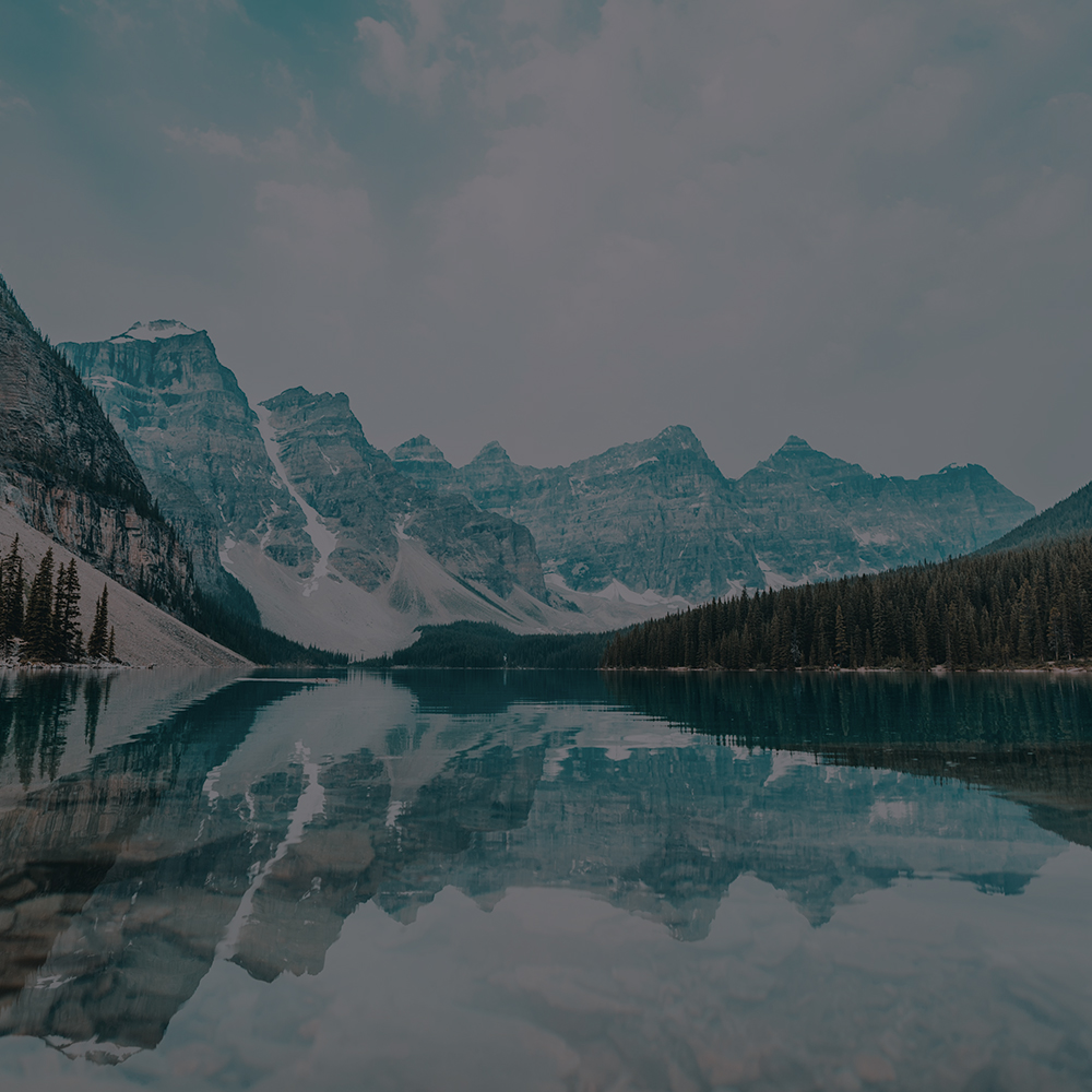 Lake with mountains reflecting in the water