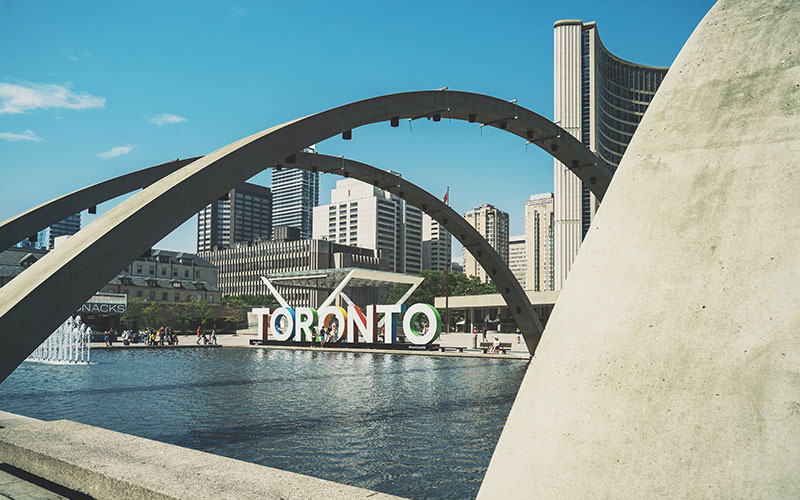 Toronto sign and fountains