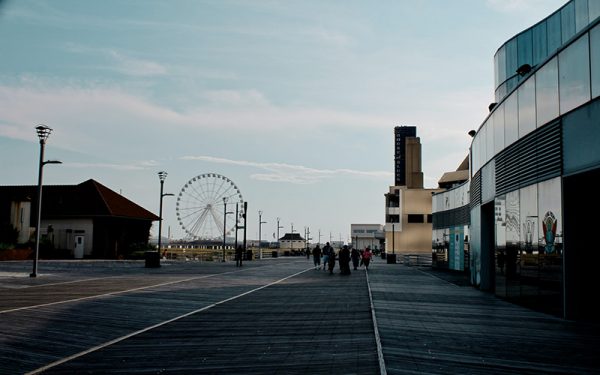Ferris Wheel and people walking in Atlantic City