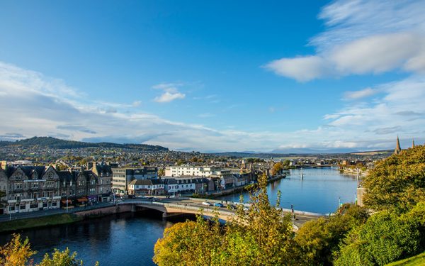 A river flowing through Inverness with a bridge going over it