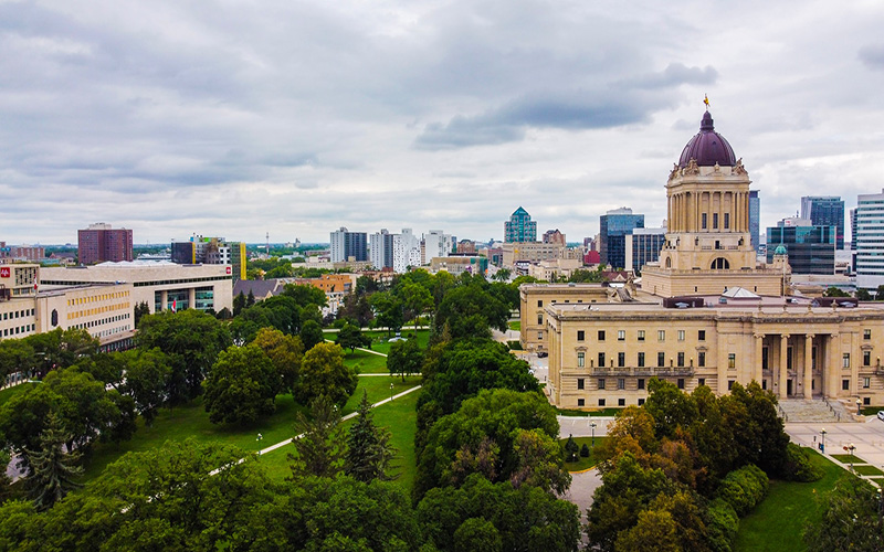 landscape of winnipeg city with trees and buildings